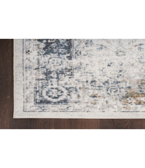 Nourison Astra Machine Washable Ivory Blue ASW16 6 ft. 7 in. X 9 ft. Rectangle Rug