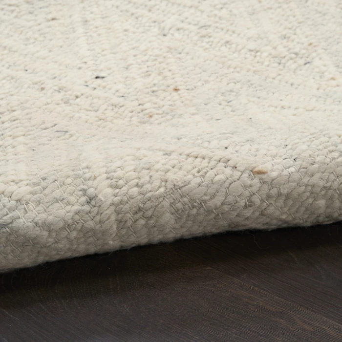 DKNY Pure Purl Cream / Ivory PUU01 5ft.3in. x 7ft.3in. Rect. Rug