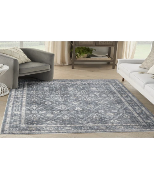 Nourison Astra Machine Washable Dark Blue ASW16 5 ft. 3 in. X 7 ft. Rectangle Rug