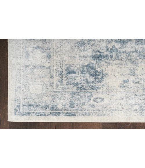 Nourison Astra Machine Washable Blue Ivory ASW11 6 ft. X 9 ft. Rectangle Rug