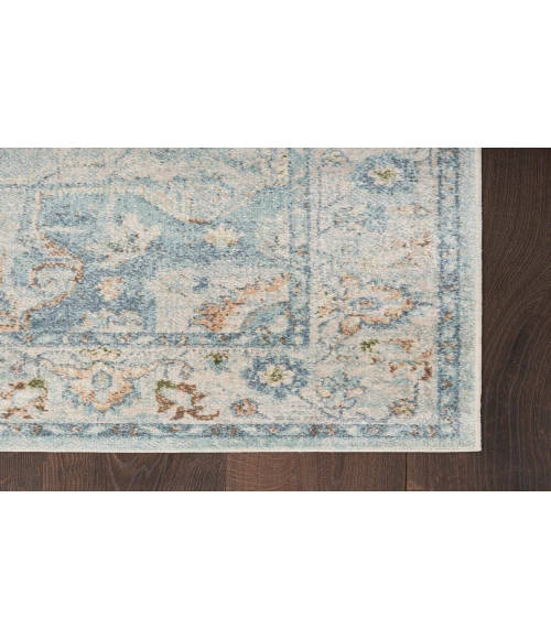 Nourison Astra Machine Washable Light Blue ASW12 6 ft. 7 in. X 9 ft. Rectangle Rug
