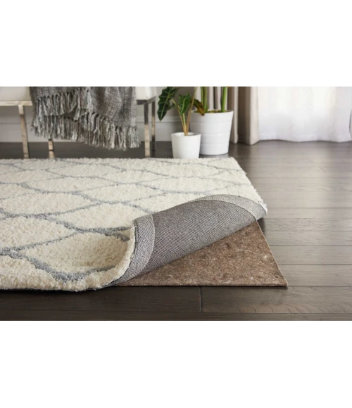 Nourison Rug-Loc Tan NR21 1 ft. X 2 ft. Rect. Rug