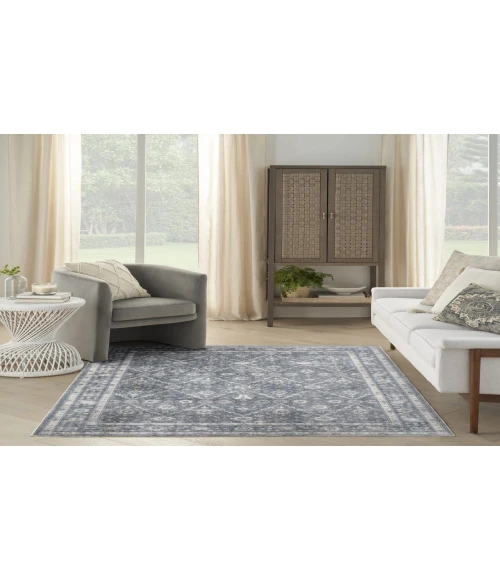 Nourison Astra Machine Washable Dark Blue ASW16 5 ft. 3 in. X 7 ft. Rectangle Rug