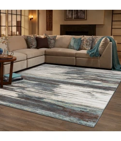 Oriental Weavers Carson 9675A Blue/ Ivory Area Rug 6 ft. 7 in. X 9 ft. 2 in. Rectangle