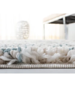 Safavieh Fontana Shag  Ivory / Teal FNT873 10 ft. X 10 ft. Round Rug