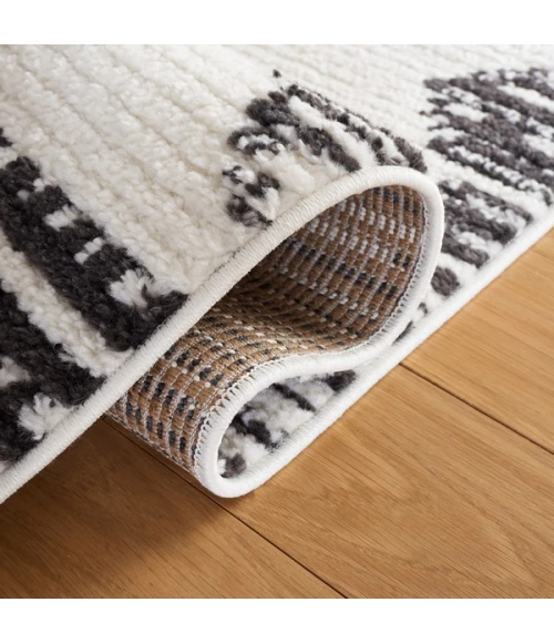 Safavieh Moroccan Tassel Ivory / Black MRT103 2 ft. 2 in. X 9 ft. Runner Rug