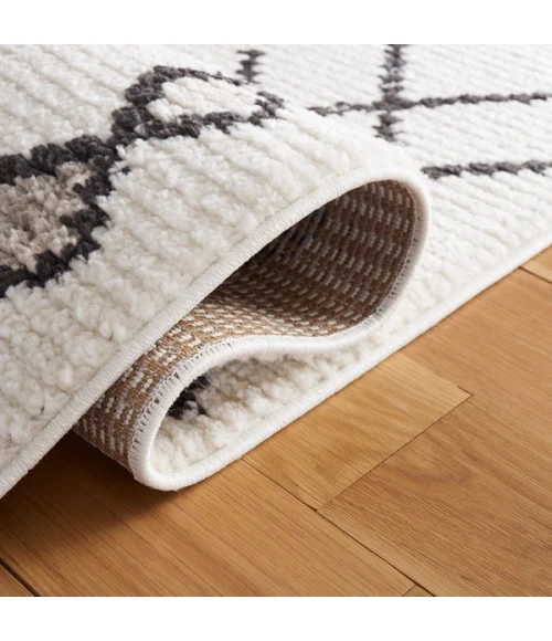 Safavieh Moroccan Tassel Ivory / Orange MRT105 2 ft. 2 in. X 9 ft. Runner Rug