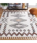 Safavieh Moroccan Tassel Ivory / Orange MRT105 4 ft. 5 in. X 6 ft. 5 in. Rectangle Rug