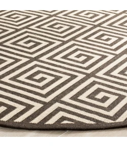 Safavieh Linden  Creme / Brown LND129 6 ft. 7 in. X 6 ft. 7 in. Round Rug